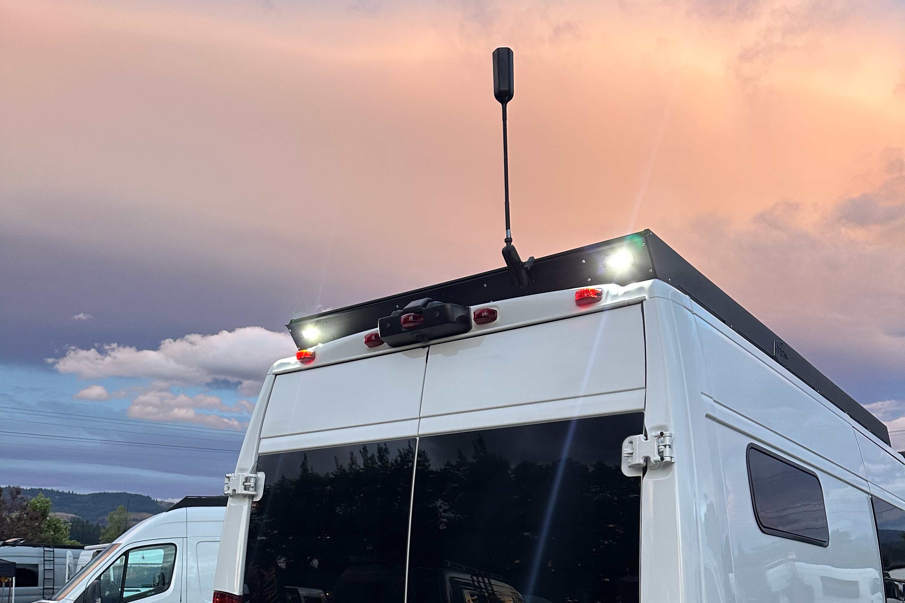 Upgraded Rear Deflector with built in scene lights pictured on Orion Roof Rack