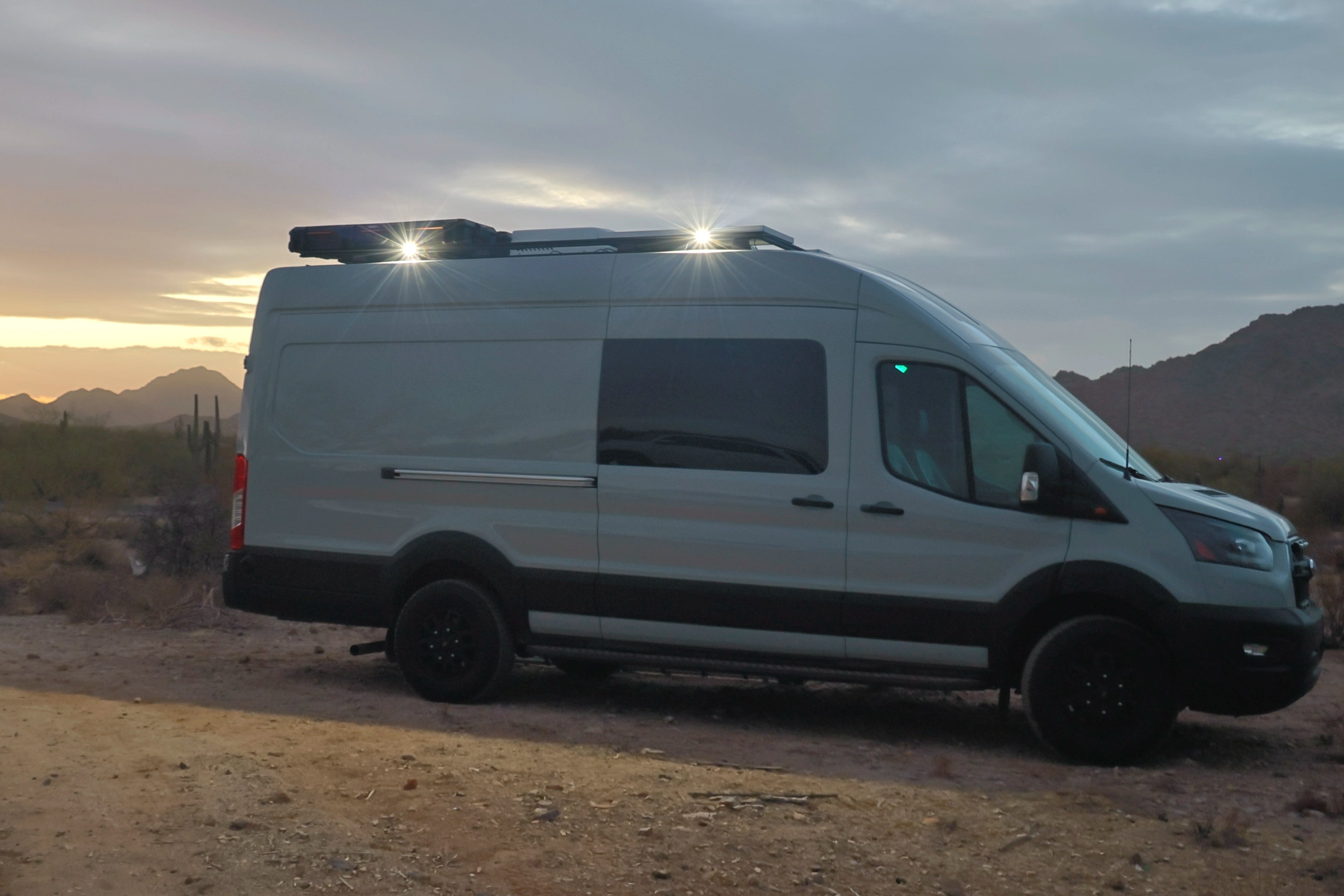 Side view of Senna 45 LED Scene Light installed on a camper van transit