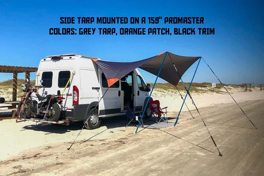Dragonfly side awning tarp mounted on a promaster at the beach