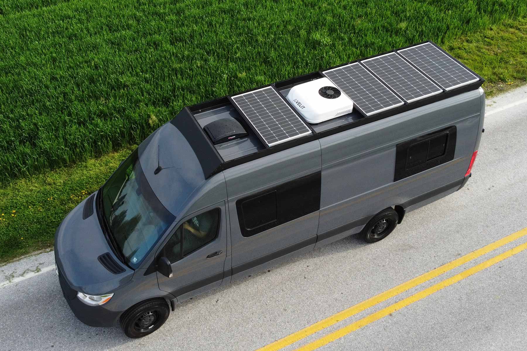 170 EXT Sprinter Van with Orion Roof Rack and 700 watts of solar panels flush mounted with Orion solar brackets