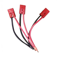 Three  to one anderson connector with red and black cables on a white background