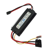 Black dc to dc module with red and yellow wires on a white background