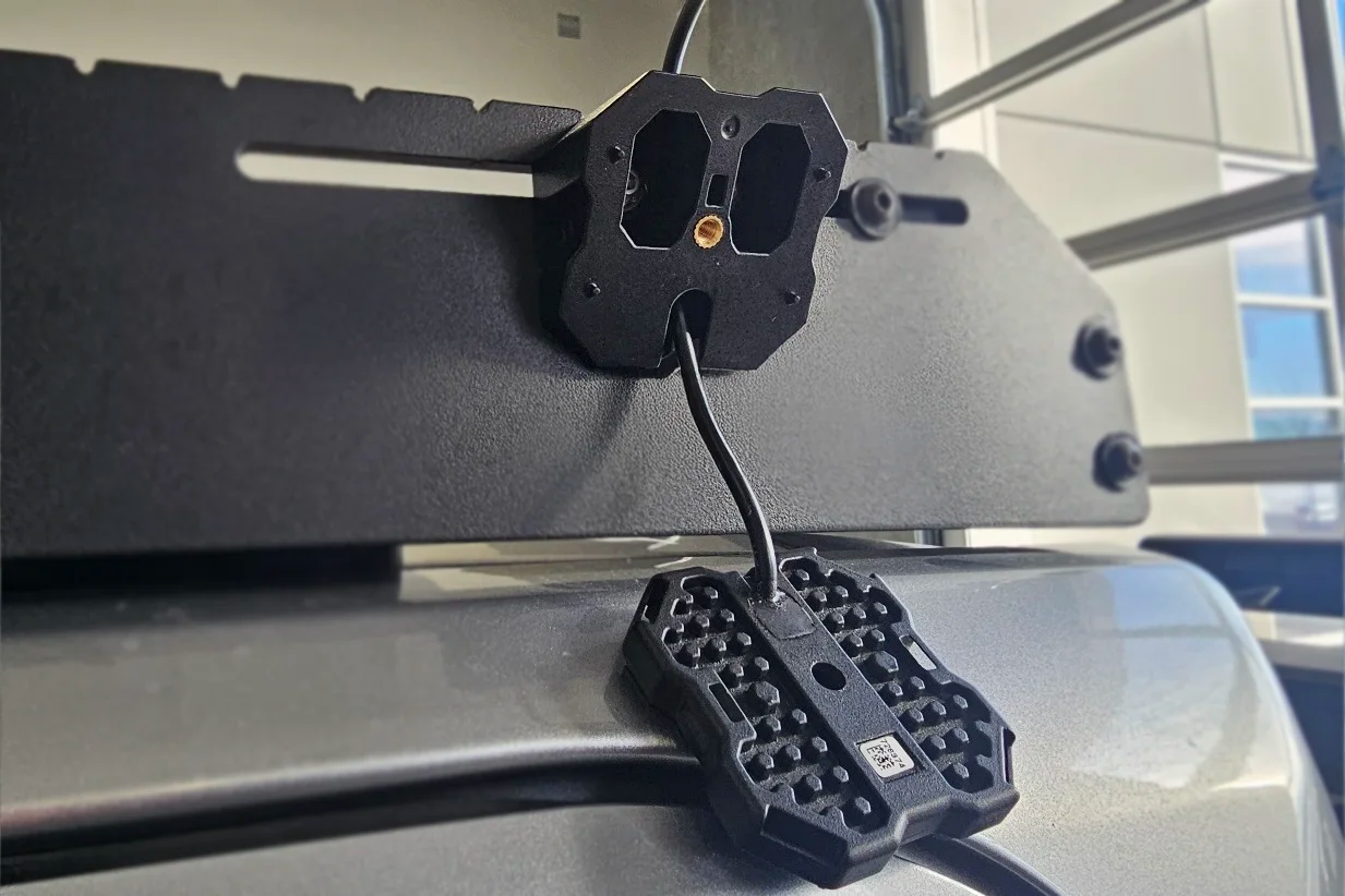 Diode Dynamics Stage Series White/Amber LED Scene Light Kit half installed on roof rack