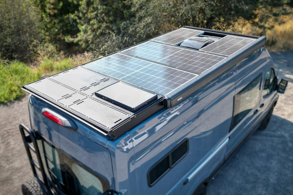 Ford Transit Roof Rack by Orion Van Gear with deck panels, starlink, awning, fan, ladder