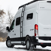 Ford transit with Orion roof rack and side ladder In the snow 