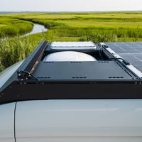 Sprinter Roof Deck Panels on an orion van gear roof rack with maxxair fan