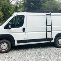 136 low roof ram promaster with orion van gear roof rack and side ladder on gravel