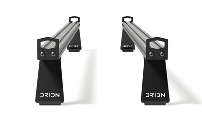 Orion Van Gear Riser Bar Kit – standard crossbar risers for Sprinter and Transit roof racks, CNC aluminum brackets with black powder coat finish.