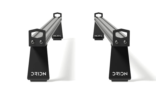 Orion Van Gear Riser Bar Kit – standard crossbar risers for Sprinter and Transit roof racks, CNC aluminum brackets with black powder coat finish.