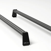 Orion Riser Bar Kit undermount configuration – crossbars installed below riser brackets for lower profile fit on Stealth+ roof racks.