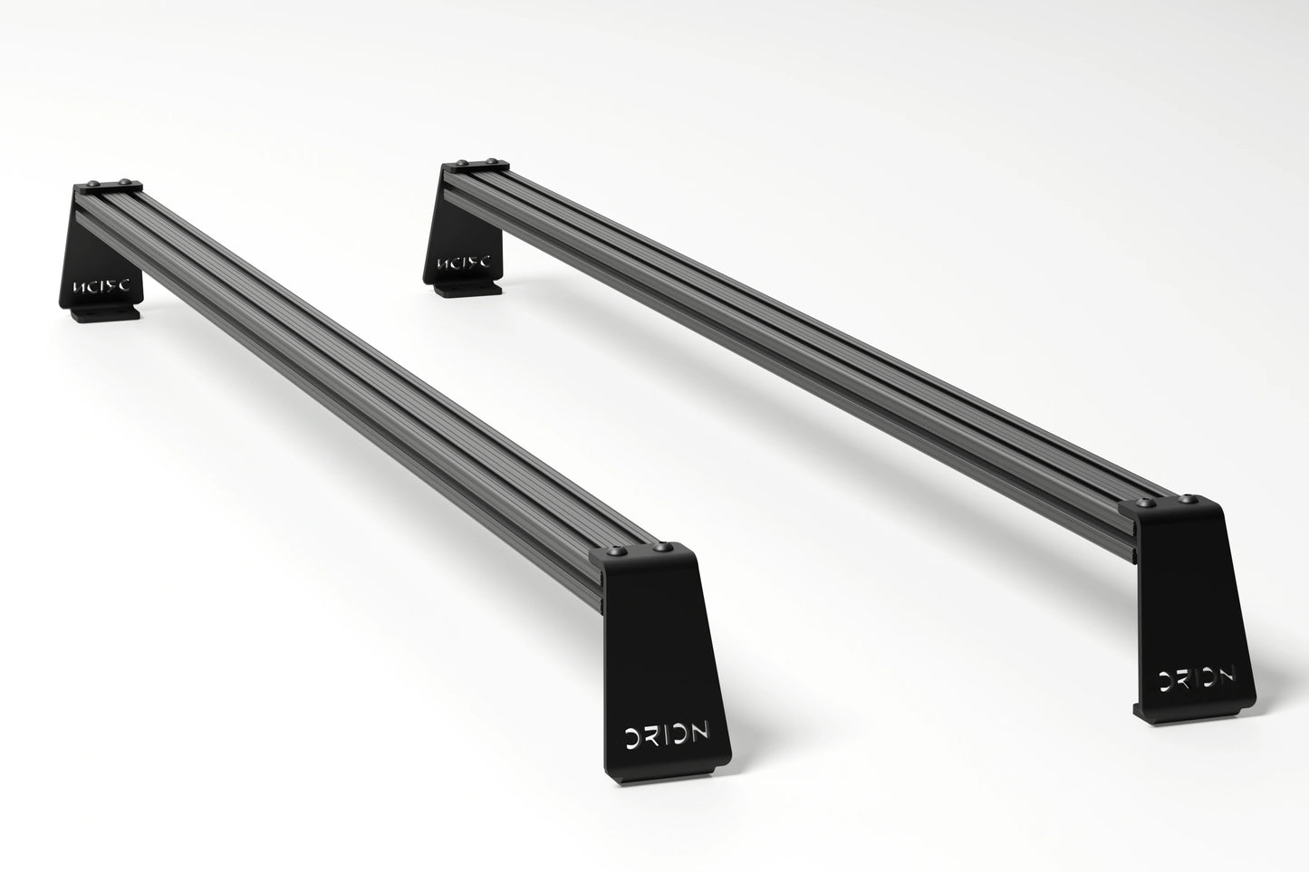 Orion Riser Bar Kit undermount configuration – crossbars installed below riser brackets for lower profile fit on Stealth+ roof racks.