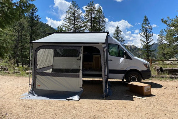 A fiamma privacy room on an f45s with orion roof rack - sprinter
