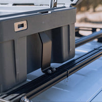 Close up of roam rigid mount and case on roof rack with 8020 crossbars