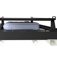 Roof rack with riser bar crossbars with solar panel over air conditioner on a van