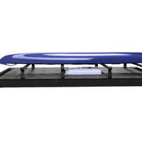 Orion Van Gear Riser Bar Kit holding a kayak above an air conditioner on transit van