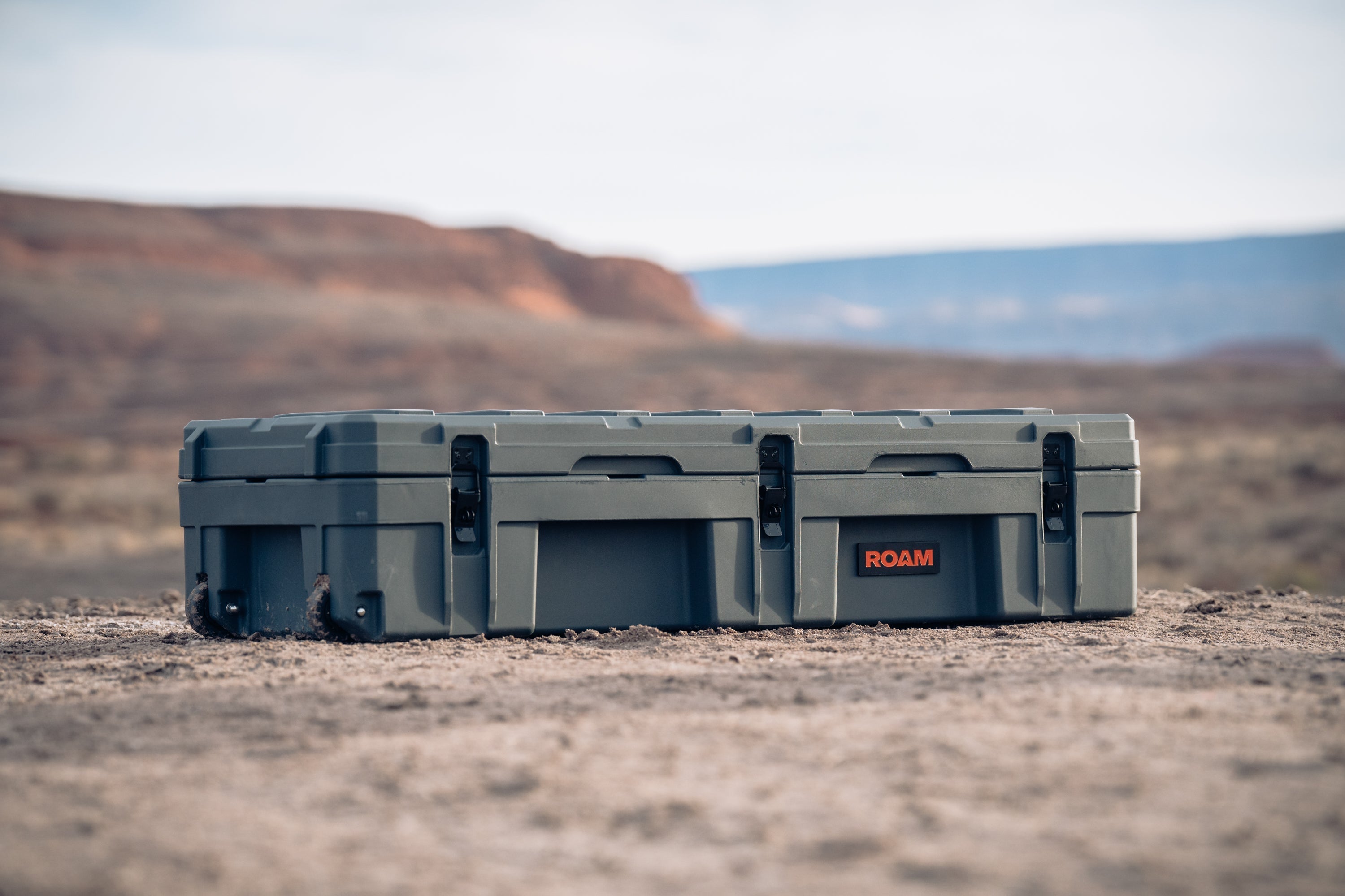 Close-up of the ROAM 128L case lockable latches and steel hinges for secure storage
