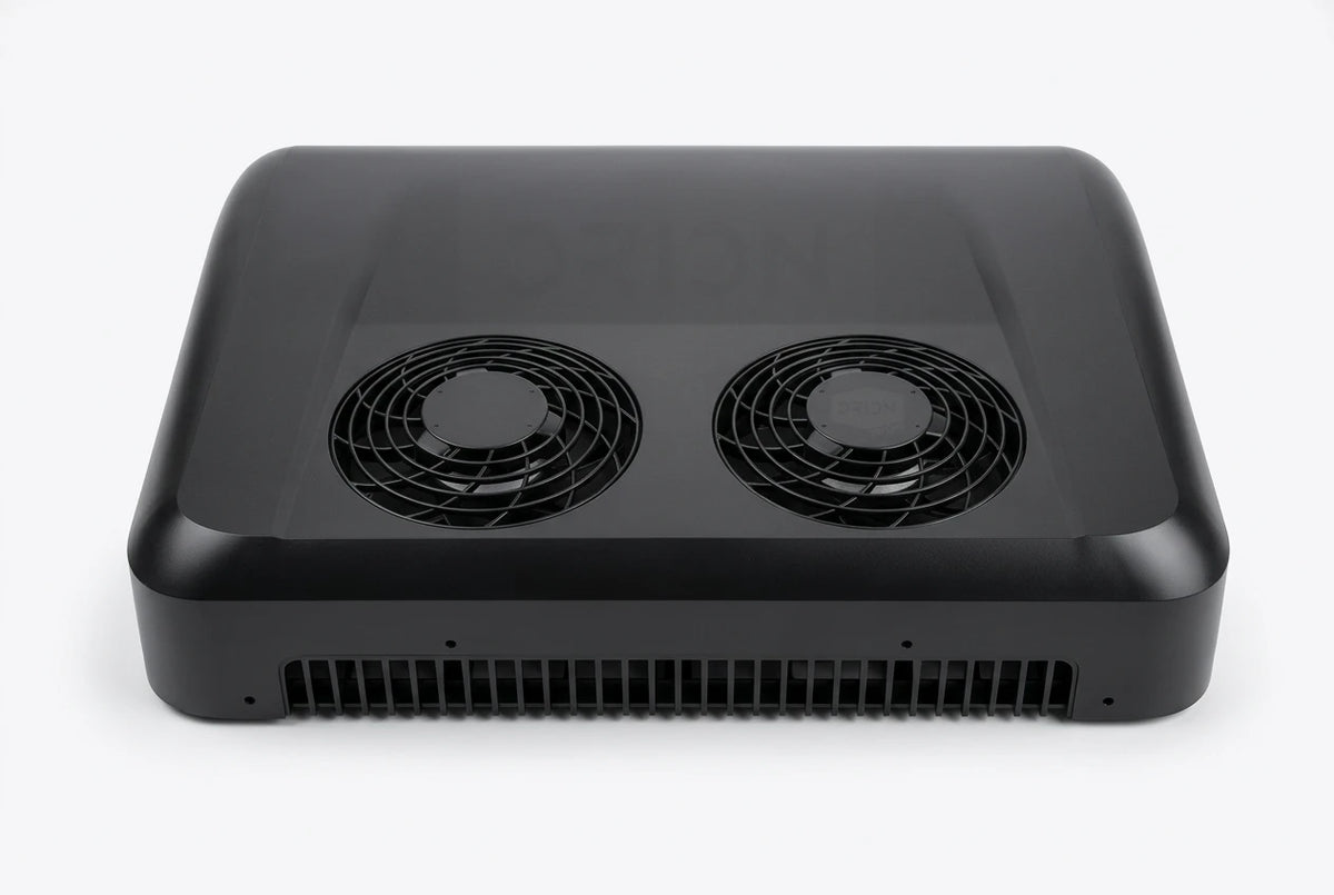 Black RoamAir R2 rooftop air conditioner and heat pump showing dual fans and rear ventilation