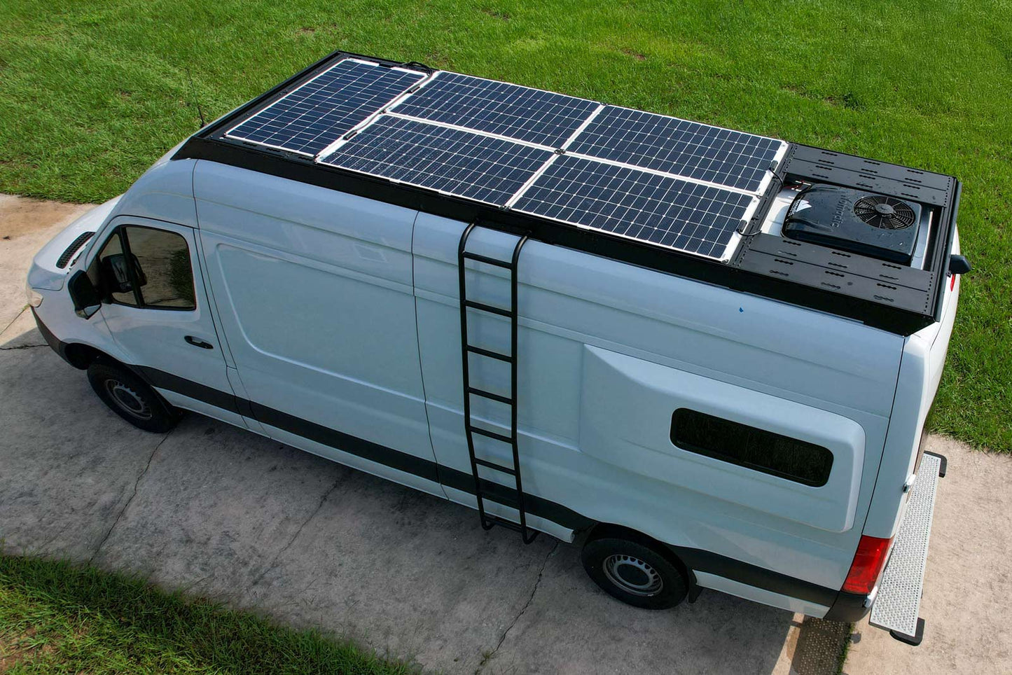 170wb high roof sprinter with 700w of walkable solar on orion roof rack and nomadic X2 AC