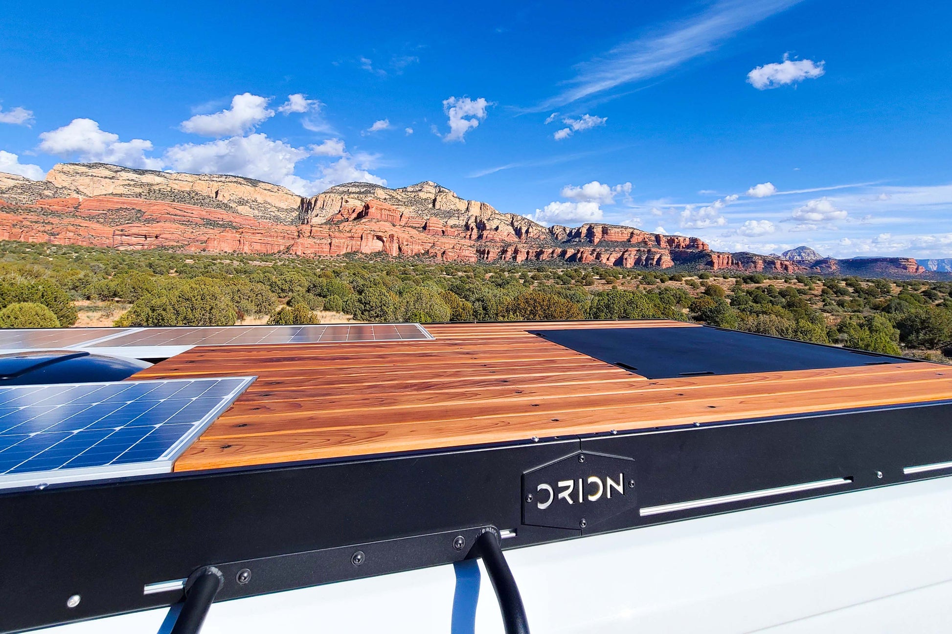 Promaster roof rack with decking and flush mounted solar by orion van gear