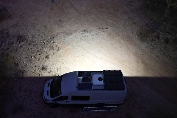 Senna 45 LED Scene Light mounted on a van roof rack at night