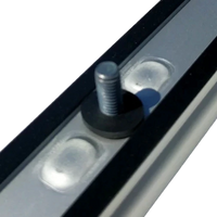 Underside view of OEM Sprinter roof rail showing stud, rubber washer, and factory sealing for watertight installation