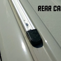 Close-up of Mercedes Sprinter roof rail rear end cap