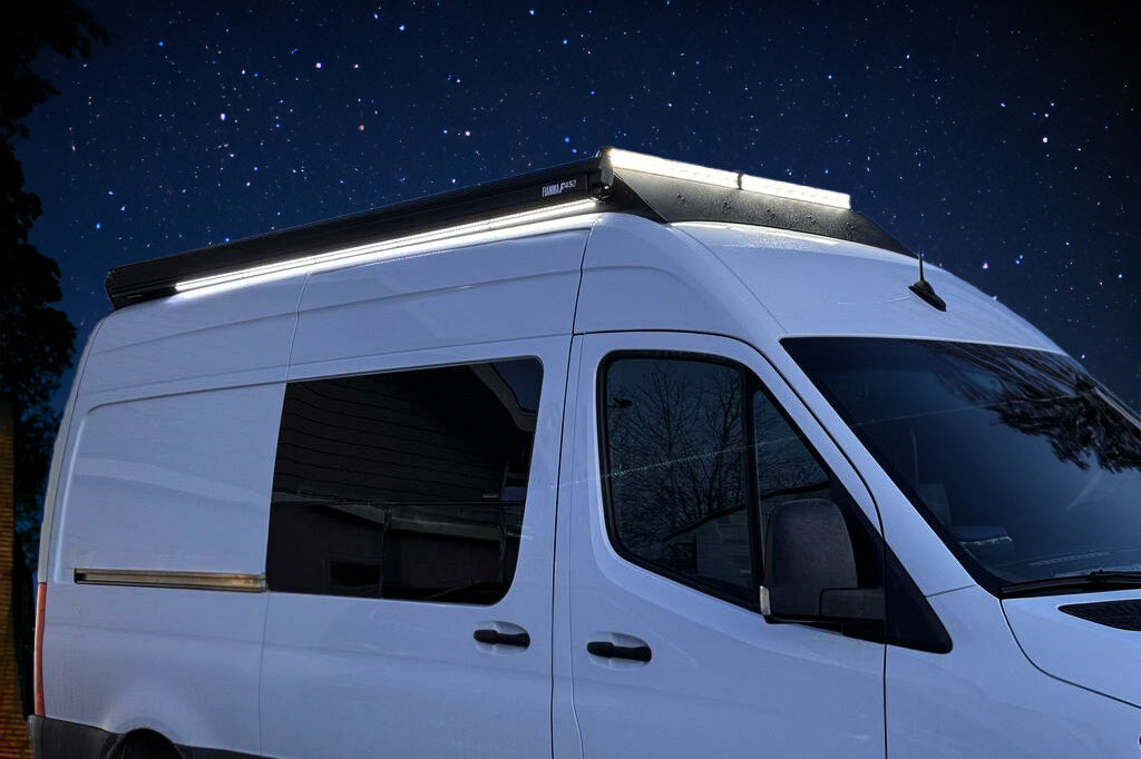 Sprinter van with orion roof rack and fiamma f45s awning and led package