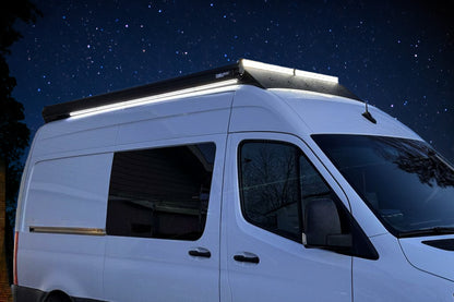 Sprinter van with orion roof rack and fiamma f45s awning and led package