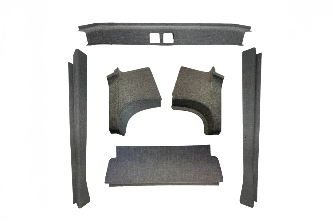 Ford Transit High Roof full interior trim kit, all parts laid out on white background - grey