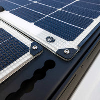 Walkable Solar Panels mounted to an Orion Van Gear roof rack using Orion corner washers