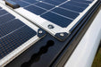 Walkable Solar Panels mounted to an Orion Van Gear roof rack using Orion corner washers