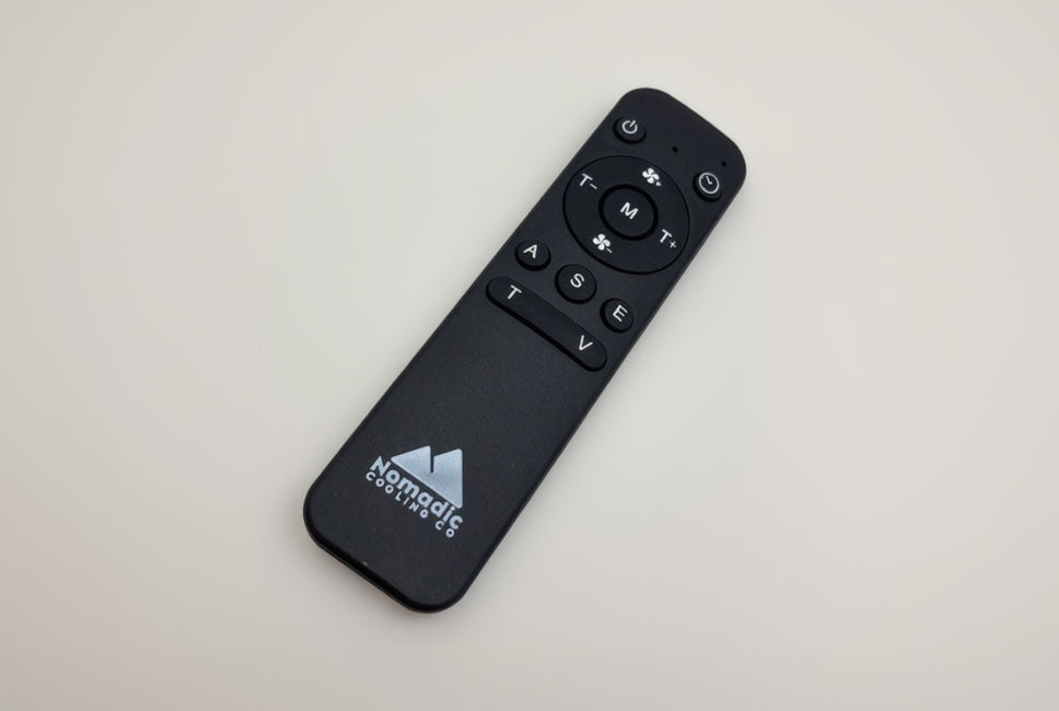 Black remote control with Nomadic Gaming Co logo on a white background