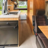 Cabinet mount layout for Tetravan Folding Shower in a camper van