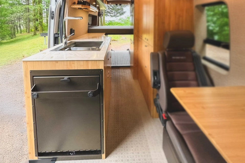 Cabinet mount layout for Tetravan Folding Shower in a camper van