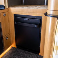 Bulkhead mount layout for Tetravan Folding Shower in an under-bed van cabinet