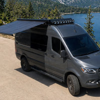 Legless Girard GG750 solar awning extended on a camper van