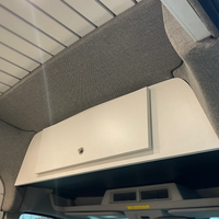 Ford Transit High Roof front trim installed, bulkhead transition close-up - grey