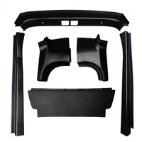 Alt text: Ford Transit High Roof full interior trim kit, all parts laid out on white background - black