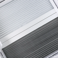 Close up of the NomadicArk 450 x 400 van and RV skylight with pleated blind and bug screen partially closed