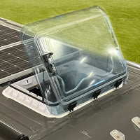 Top down view of a NomadicArk 700 x 500mm van and RV skylight with bug screen and shade shown on a van roof