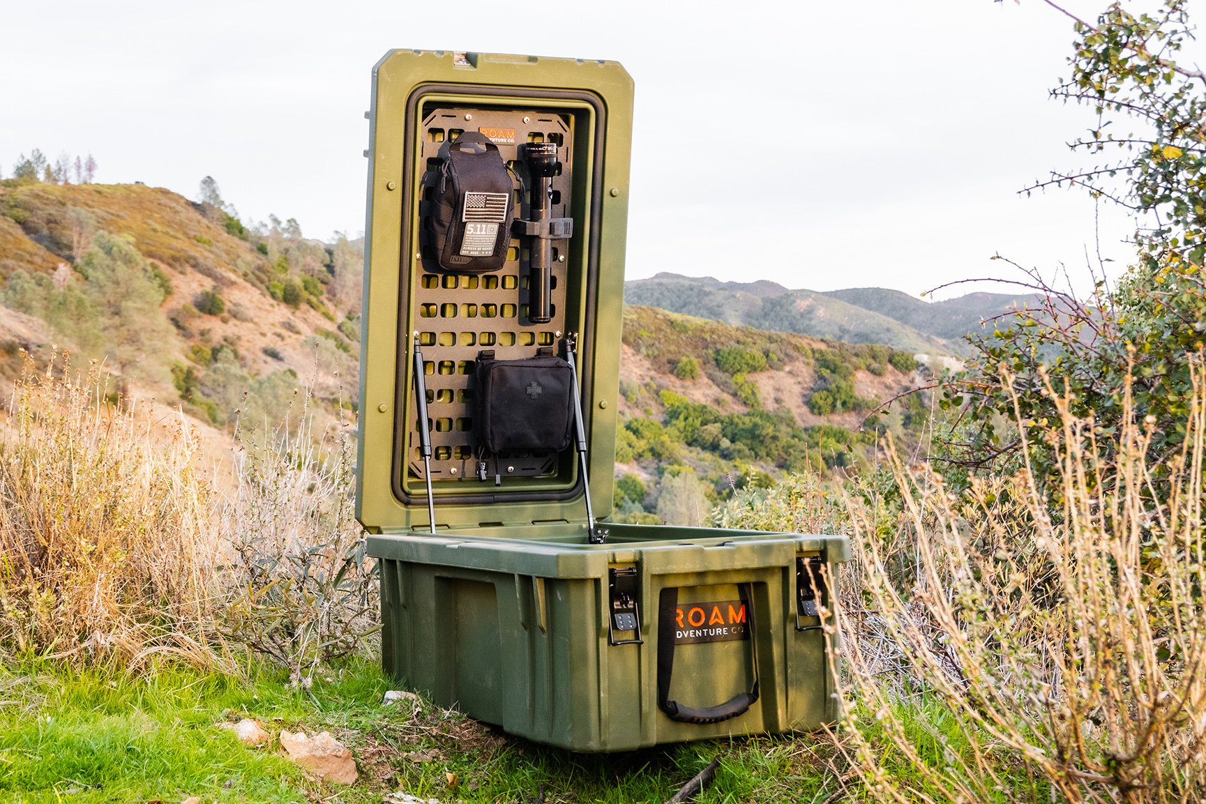 105L Molle Panel insert for roam case shown with flashlight, first aid kit, and more