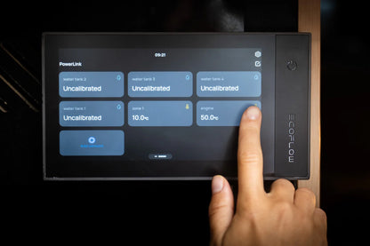 EcoFlow Power Kit touchscreen monitor showing water tanks, temperature zones, and engine data via PowerLink interface.