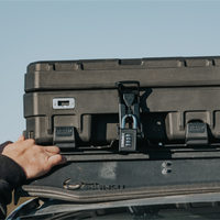 Roam 83L Rugged quick release mount on roof rack with lock