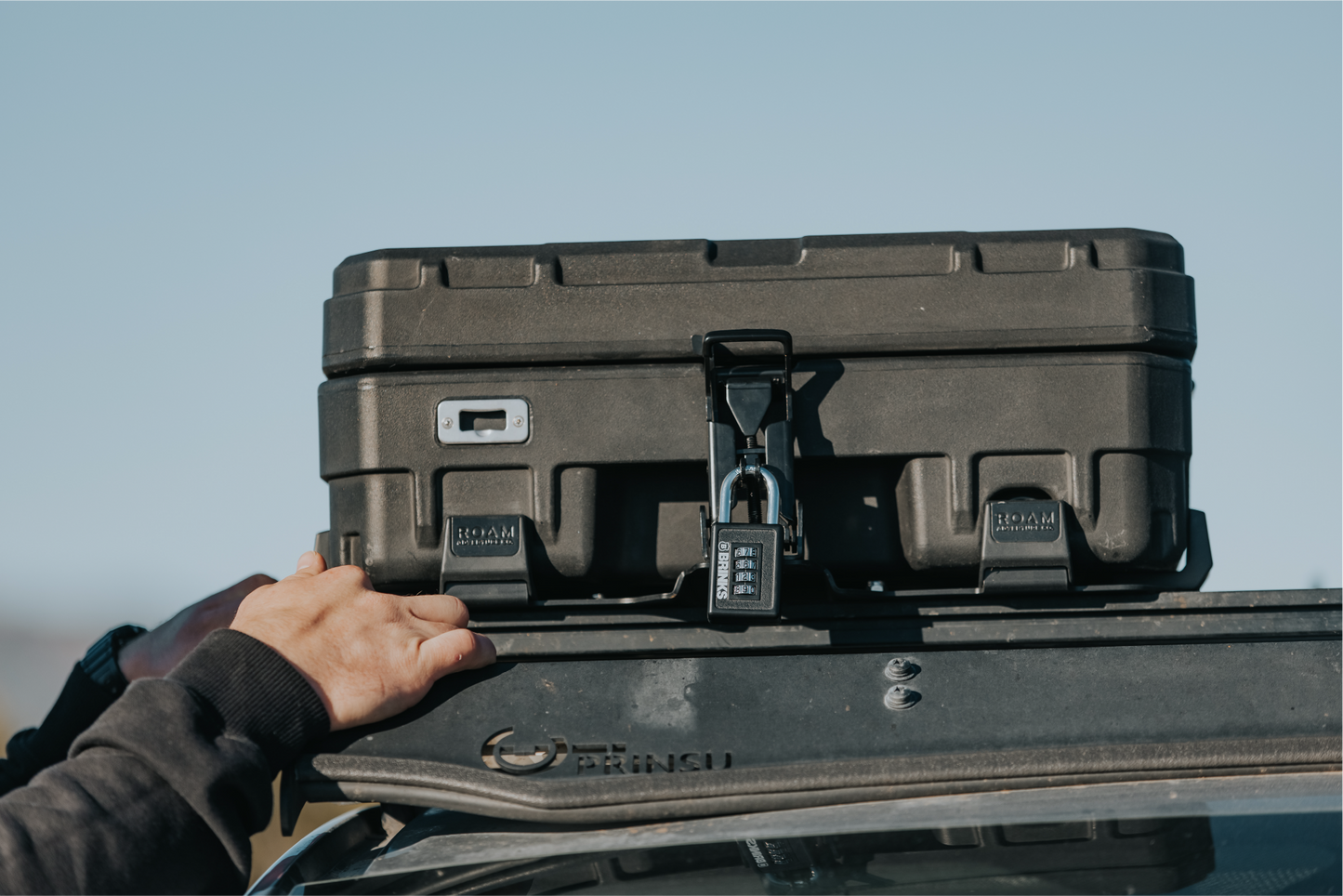 Roam 83L Rugged quick release mount on roof rack with lock