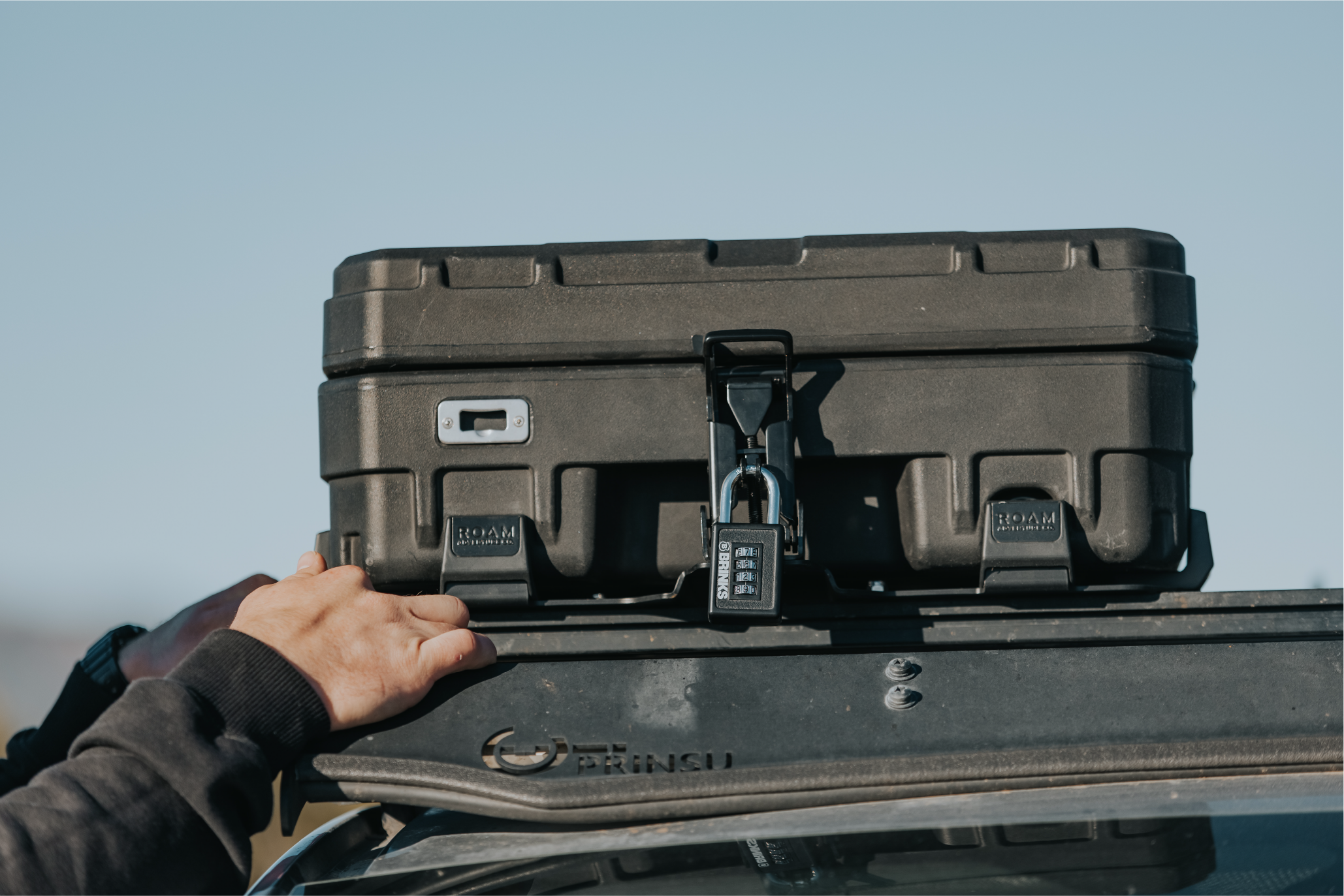 Roam 83L Rugged quick release mount on roof rack with lock