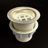 Close-up of stainless steel van shower pan drain
