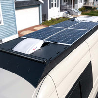 4 - 150 watt walkable marine solar panels (white backing) on an orion van gear roof rack