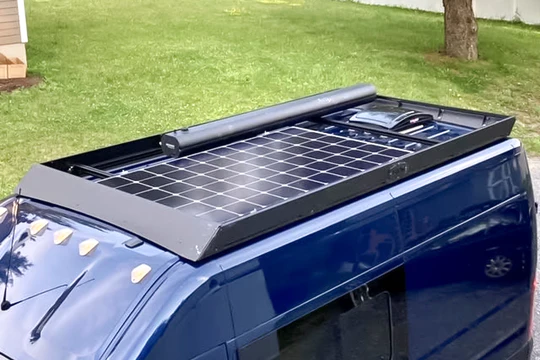 136 promaster stealth+ roof rack with large solar panel and shower