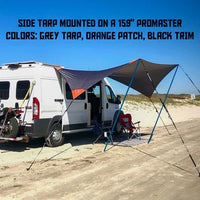 Dragonfly side awning tarp mounted on a promaster at the beach