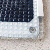 Close up of mounting corners and ETFE laminate non-skid surface (panel has white backing)